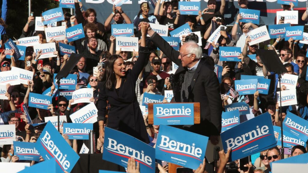 Bernie Sanders and Alexandria Ocasio-Cortez at a rally in New York